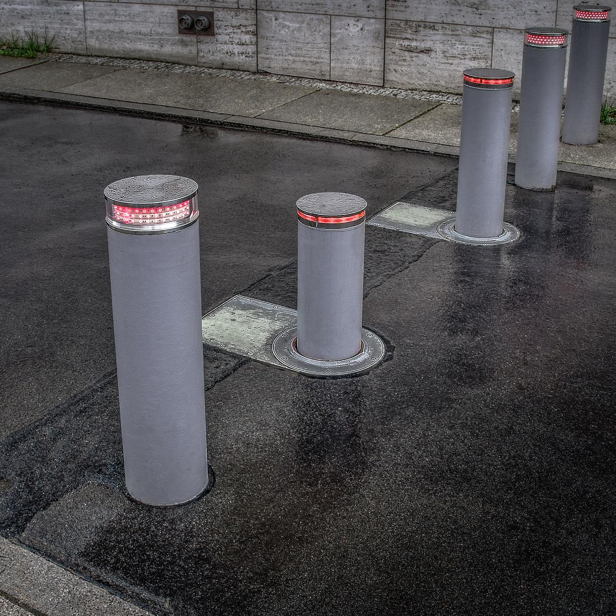 Electric automated road bollards